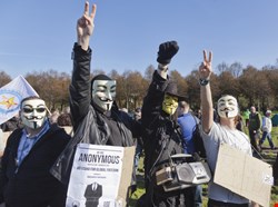 U.S. Indicts 13 Anonymous Members 