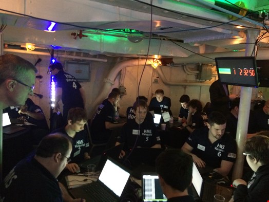 Cyber Security Challenge contestants hard at work aboard HMS Belfast