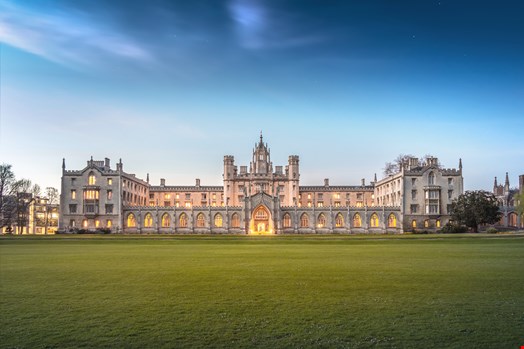 View of New Court's Clock Tower of St John's College, University of Cambridge, in twilight, April 18, 2015. Credit: PoohFotoz / Shutterstock.com