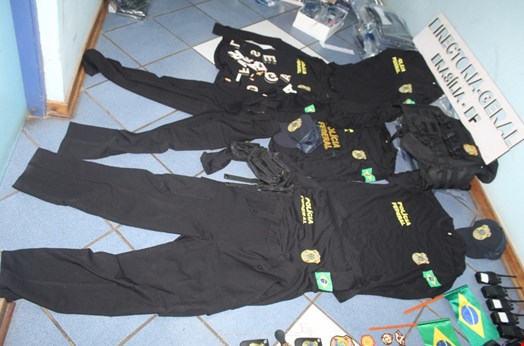 In Eswatini, police dismantled a criminal network running illegal online gambling, money laundering and elaborate impersonation scams, including a fraud scheme involving fake Brazilian police officers. Credit: Interpol