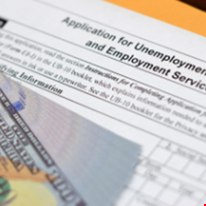 Eight Charged with m Unemployment Benefits Fraud