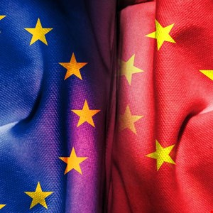 Digital map of Europe with red cyber attack icons targeting government buildings and diplomatic flags