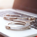 Police Celebrate Arrest of 59 Suspected Scammers